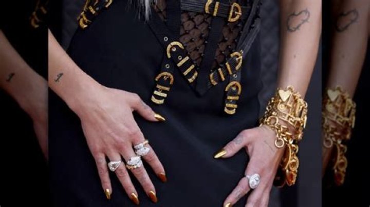 Unveiling The Hidden Symbolism And Intimate Truths Behind Dua Lipa's Tattoos